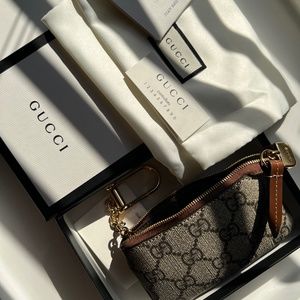 GUCCI SUPREME KEY POUCH